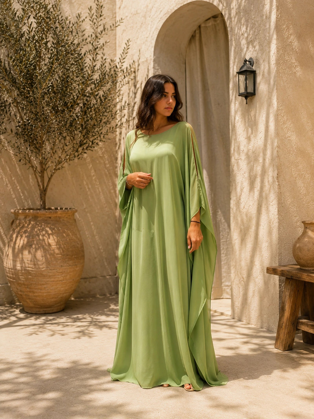 Noura dress in a deep colour